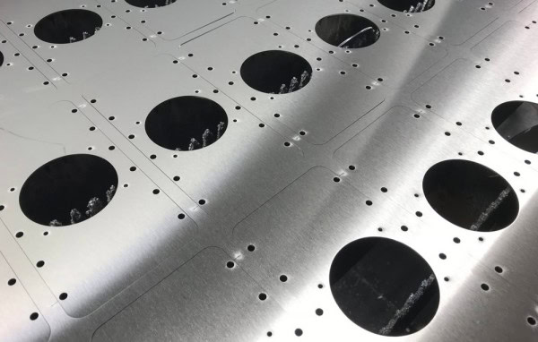 Highly durable Wstitanium steel sheet featuring precision-drilled holes, ideal for manufacturing and industrial applications requiring lightweight, strong, and corrosion-resistant materials.