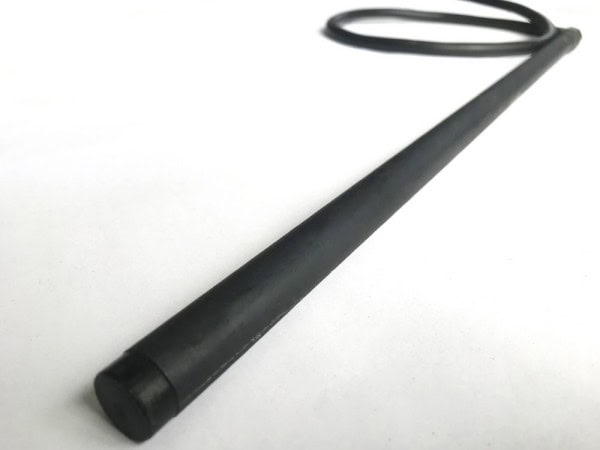 A close-up of a tungsten electrode used for welding, featuring a long, black, cylindrical shape with a loop at the end, suitable for industrial welding applications.