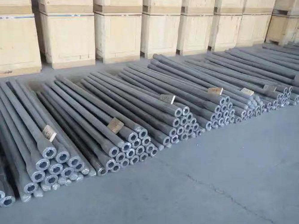 Aluminum heat-resistant titanium pipes stacked for industrial use. Ideal for aerospace, construction, and manufacturing applications. High-quality, durable titanium tubing available now.